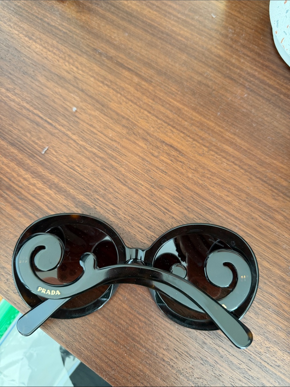 Prada Black Swirl Round Sunglasses - Designer Women's Shades